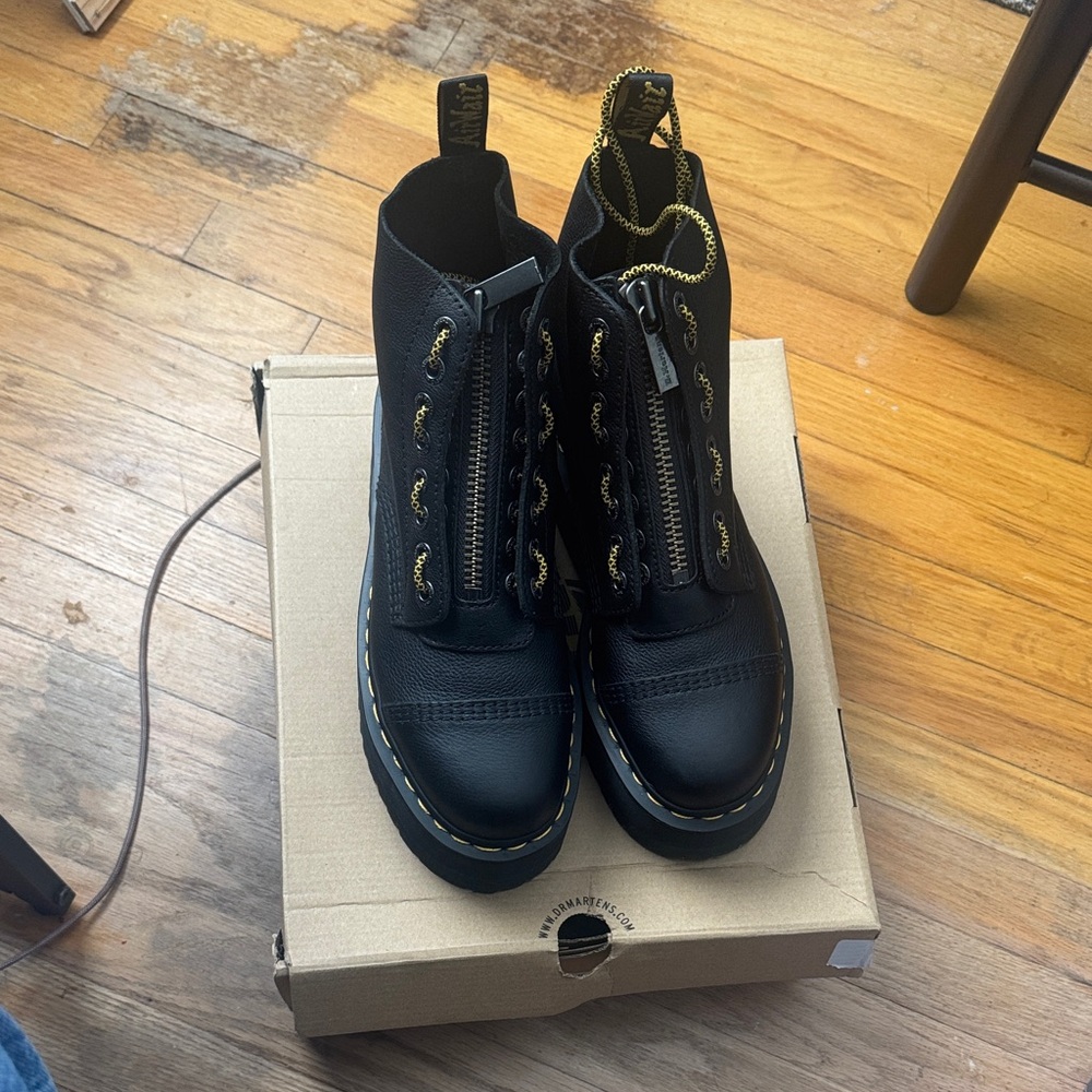Dr. Martens Black Leather Zip-Up Ankle Boots with Yellow Stitching